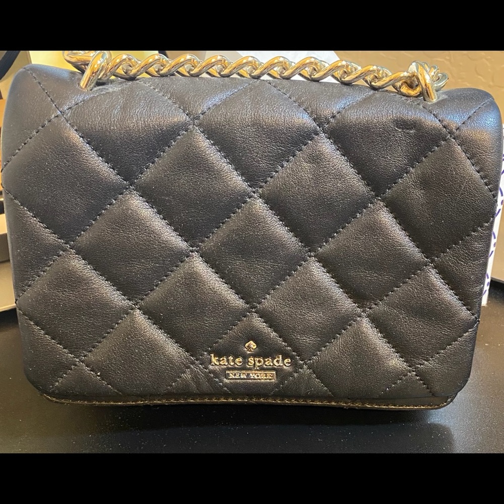 Small Kate Spade purse. Previously loved.